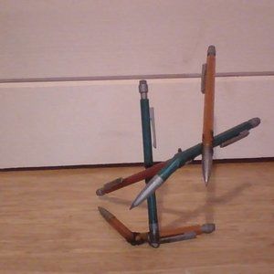 perfectly balanced abstract rrangement of pencils